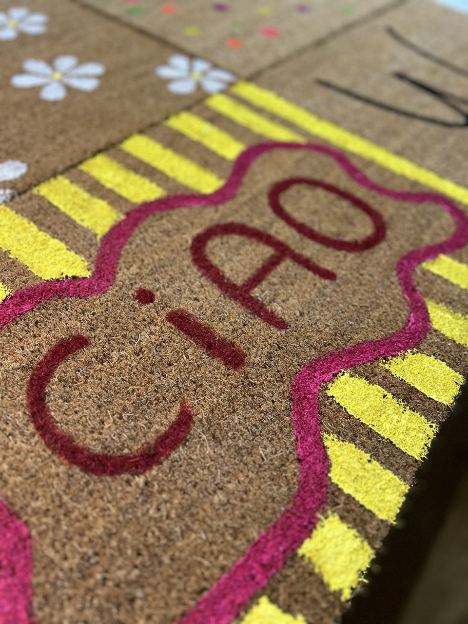 Fußmatten Workshop Kaarst – bemalte Fußmatte mit Ciao-Schriftzug