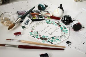 Aquarell Lettering Workshop Kaarst – Weihnachtskarte mit gemaltem Aquarell-Kranz und Schriftzug Merry and Bright